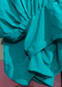 Exquisite Teal Saree with Intricate Gold Embellish