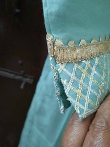 Elegant premium Teal Kurta set with Embellished Ne
