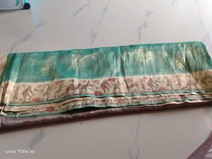Beautiful Teal Saree with Golden Print