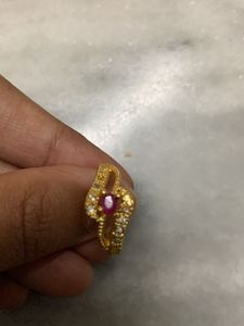 Elegant Gold Ring with Ruby Accent
