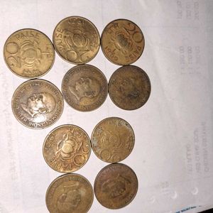 10 brass twenty paisa coins