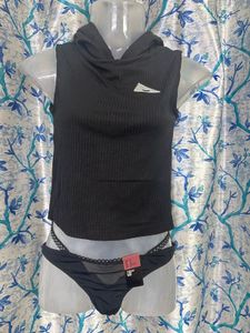 Edgy Black Ribbed Crop Top with Buckle Detail