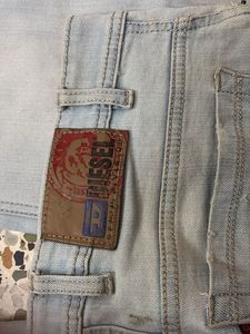 Light Wash Distressed Denim Jeans
