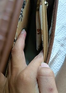 Chic Brown Handbag with Gold Logo