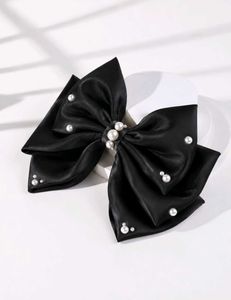 Elegant Pearl Embellished Bow Hair Clip