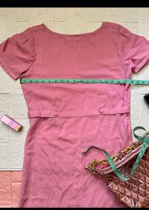 Chic Pink Midi Dress with Cutout Hem