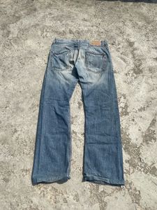 Distressed Wash Jeans