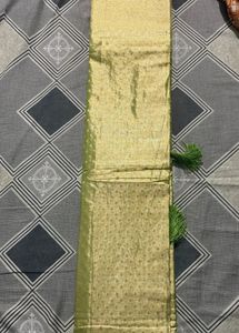 Elegant Gold Saree with Tassels