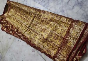 maroon patora saree