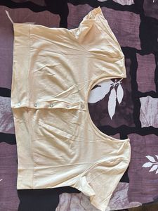 pastel yellow button-down crop top blouse.