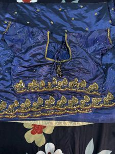 Royal Blue Embroidered Silk Saree.           some