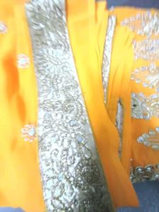 Vibrant Yellow Embellished Saree with stitched blo