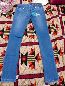 Slim Fit Stretchable Denim Jeans (Mid-Wash Blue)