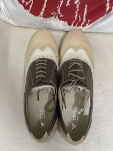 Vintage-Inspired Wingtip Oxfords