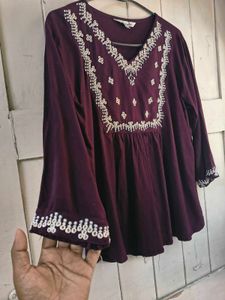 burgundry short kurti with minor flaw