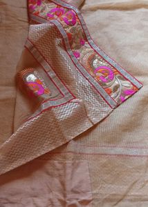 Elegant Beige colour Embroidered Saree