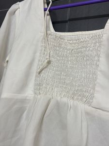 Floral Embroidered Peplum Top