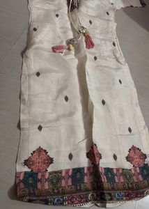 Elegant Cream Kurta Set with Tassels