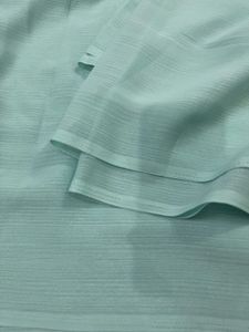 Elegant Turquoise Saree with Purple Blouse