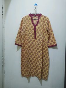 Ruhaans Yellow Kurta With Maroon Prints And Trim