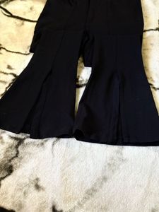 Trendy Black Flare Pants with Slits