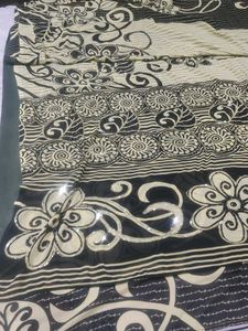 Elegant Saree with Floral Design cream and black