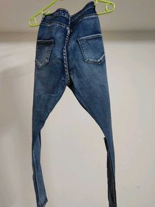 Distressed Blue Denim Jeans