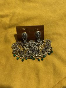 Golden chandbali with green small pearls