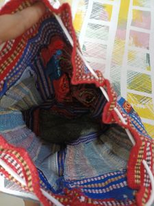 Embroidered bag pack lovely for travel and trendy. Totally unused.