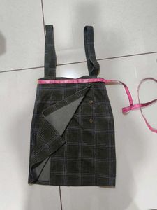 checked skirt with belt