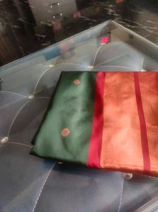 Elegant Green Saree with Red Border