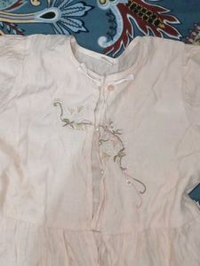 Embroidered peach Peplum top