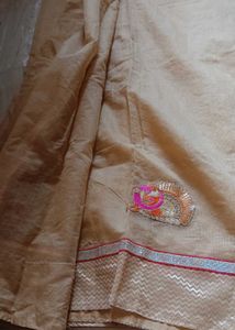 Elegant Beige colour Embroidered Saree