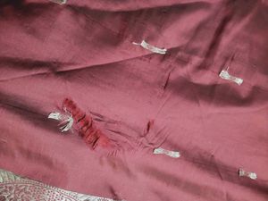 Elegant Maroon Saree with Golden Accents