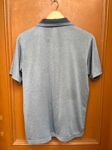 Red face performance polo
