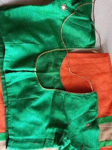 Vibrant Orange Saree with Embellished Blouse