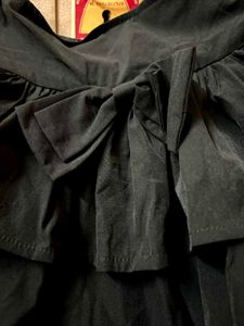 mini skirt black colour with chain , bow and inner