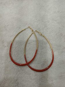 Chic Hoop Earrings with Red Accent