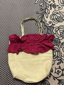 Beige Tote Bag with Red Ruffle Detail