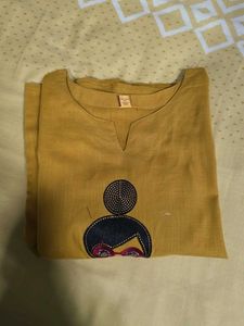 Stylish Mustard Kurta Set with Embellished Necklin