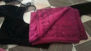 wine colour net saree with black velvet blouse