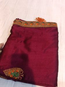 Elegant Maroon Saree with Gold Embroidery