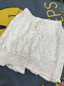 black shrug with white shorts