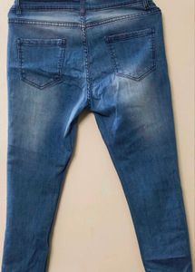 Beige Trousers And Blue Denims