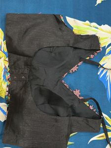Elegant Black Saree with Floral Blouse
