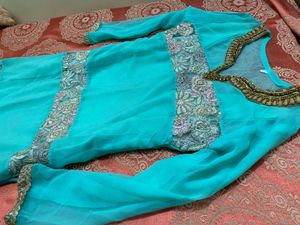 Elegant Teal Kurta Set with Intricate Embroidery
