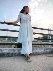 White kurta set + free orange heavy duppatta
