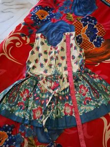 1 Peplum top and 3 Frocks