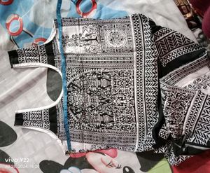 2 Black &amp; White Patterned kurtas