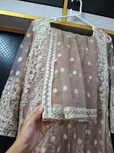 Elegant Beige Embroidered Anarkali gown
